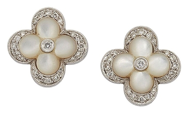 A pair of mother-of-pearl and diamond cluster earstuds,...