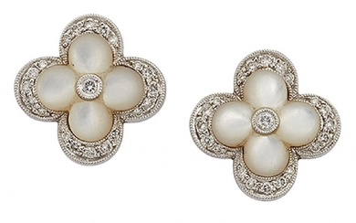 A pair of mother-of-pearl and diamond cluster...