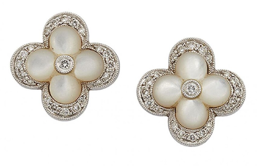 A pair of mother-of-pearl and diamond cluster...