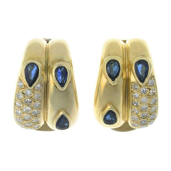A pair of sapphire and diamond earrings. Estimated