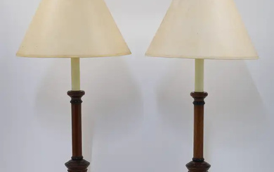 A pair of turned wood table lamps, 20th century, of columnar form...