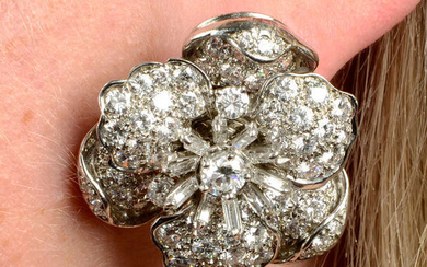 A pair of vari-cut diamond floral earrings, by Tiffany & Co.