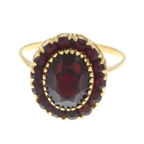 A red paste cluster ring.Ring size Q1/2. 5gms.