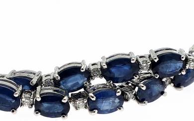 NOT SOLD. A sapphire and diamond bracelet set with numerous oval-cut sapphires weighing a total...