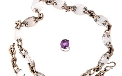 A silver and rock crystal chain and amethyst ring, the chain composed of marine links interspersed with oval rock crystal links to a hook clasp, length 97cm, the ring claw set with an oval mixed-cut amethyst, ring size J 1/2 (2)
