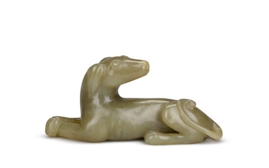 A small celadon jade carving of a recumbent dog, Qing dynasty, 19th century | 清十九世紀 青玉臥犬, A small celadon jade carving of a recumbent dog, Qing dynasty, 19th century | 清十九世紀 青玉臥犬