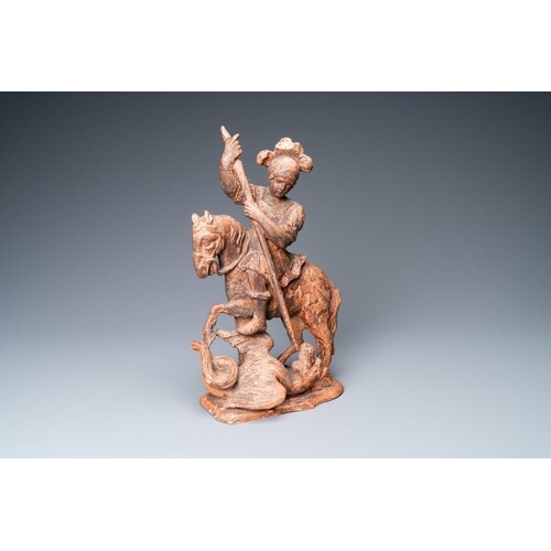 A terracotta imitating monochromed wood figure of Saint Geor...