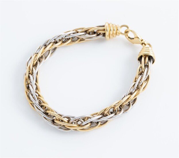 A two-tone 18ct gold rope bracelet (Geneva), Length 18.5cm, wt....