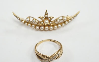 A yellow metal and seed pearl cluster set crescent shaped br...