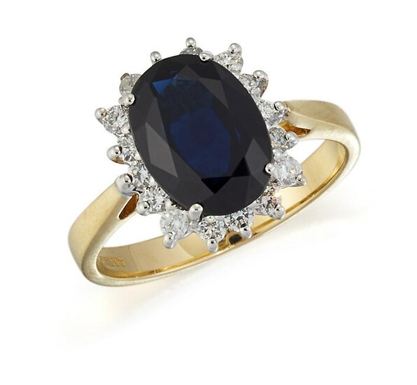 AN 18CT GOLD SAPPHIRE AND DIAMOND CLUSTER RING, an