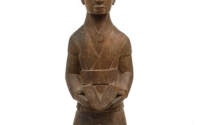 AN AFRICAN WOOD CARVING ATTRIBUTED TO BAMGBOYE