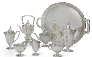AN AMERICAN SILVER SEVEN-PIECE TEA AND COFFEE SERVICE AND MATCHING SILVER-PLATED TWO-HANDLED TRAY