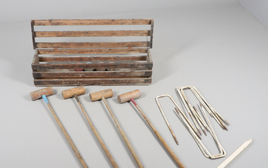 AN EARLY 20TH CENTURY CROQUET SET.