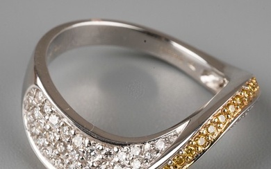 An 18ct white gold yellow and white diamond dress ring, set ...