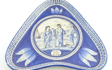 An 18thC Dutch blue and white dish of triangular form.
