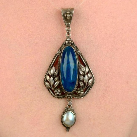 An Arts & Crafts silver blue gem and blister pearl foliate pendant, by Horace Minns for the