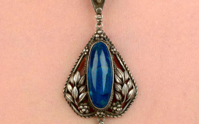 An Arts & Crafts silver blue gem and bluster pearl foliate pendant, by Horace Minns for the Artificers' Guild.