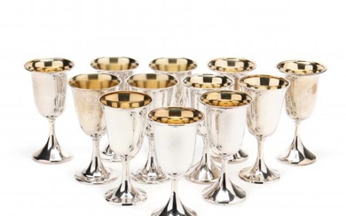 An Assembled Set of Twelve Parcel Gilt Sterling Silver Goblets