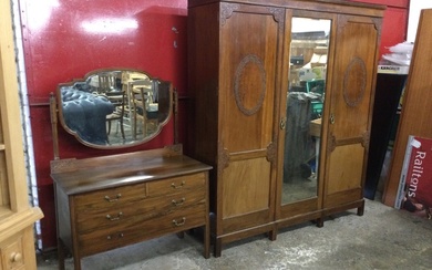 An Edwardian mahogany wardrobe & dressing table with blind fretwork...