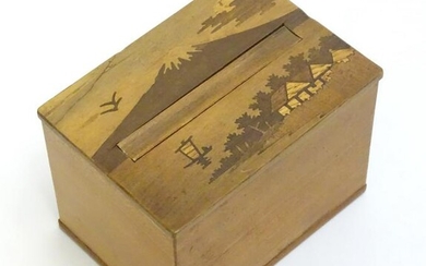 An Oriental cigarette dispensing box with marquetry /
