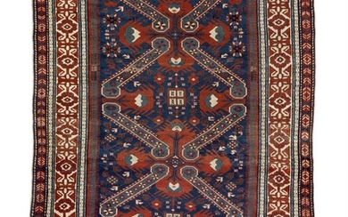 An antique Caucasian rug, most likely from the Baku district. Centre design with characteristic cross design. Early 20th century. 225×145 cm.