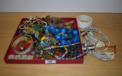 An assortment of costume jewellery including various beaded necklaces, statement collar necklaces