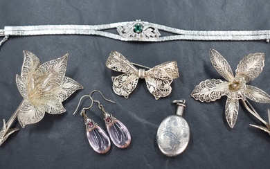 An assortment of silver and white metal jewellery comprising a silver perfume bottle pendant, a pair