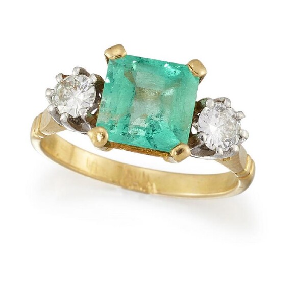 An emerald and diamond three stone ring,...