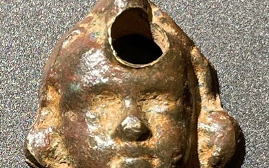 Ancient Roman Bronze Head of Eros secondary pierced to be worn as an Amulet. With an Austrian Export License.