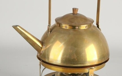 Art Deco brass water kettle with comfort. Circa 1920.