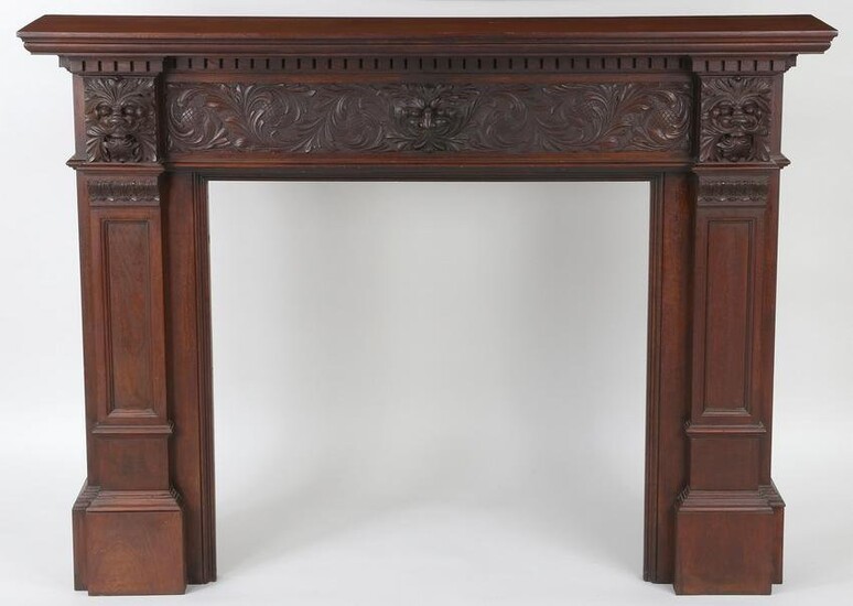 Carved mahogany mantle