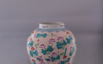 China, 20th century Polychrome porcelain vase decorated with herons and mandarin ducks among lotuses with coral background, apocryphal mark Tonghui at the base