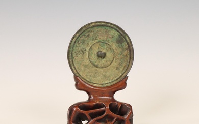 China, a bronze circular mirror, possibly Tang dynasty (618-907)