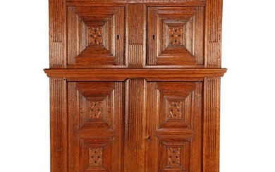 (-), Oak Renaissance richly decorated 4-door cabinet with...