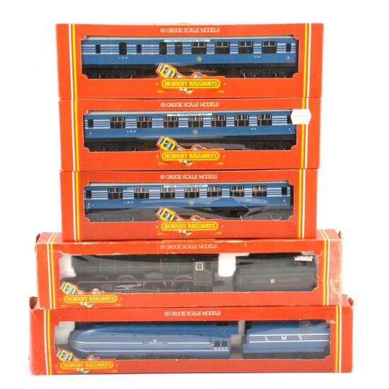 Hornby OO gauge model railways, two locomotives and three passenger coaches.