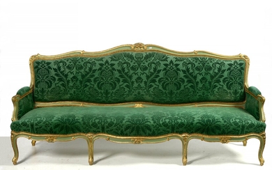 Important Louis XV style sofa with three seats in carved wood, gilded and green patinated upholstery with green floral decoration. Period: 19th century (?). L.:+/-238cm.