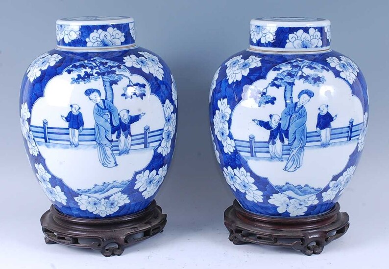 A pair of 19th century Chinese export blue and white ginger jars and covers