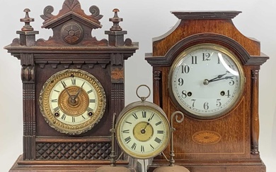 Lot details An Edwardian inlaid mahogany mantel clock, having unsigned...