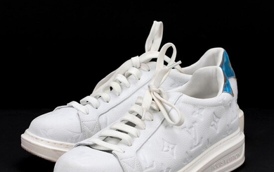 Louis Vuitton A pair of sneakers ofh white monogram leather with laces...