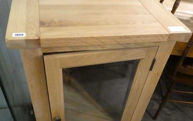 Modern light oak single door entertainment cabinet with single drawer...