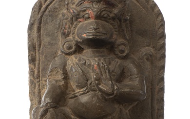 NEPAL - Mahakala en pierre grise agenouillé et les mains en abhaya varada mudra