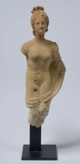 "Naked female figure in drapery" in terracotta. Period: Hellenistic, Taranto. Period: 3rd - 2nd century BC. Provenance: Belgian private collection formed in the 1990s by Mr. D.A. A thermoluminescence test is attached. (Missing feet). H.(out of base):...