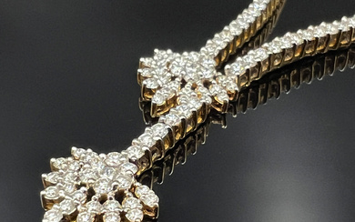 Necklace 750 yellow gold and white gold with lavish diamond setting.