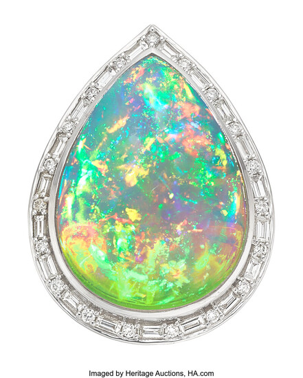 Opal, Diamond, White Gold Ring Stones: Opal cabochon weighing...