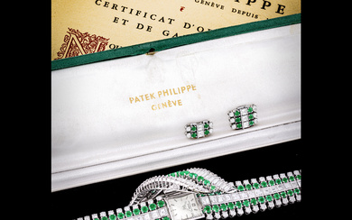 PATEK PHILIPPE. AN EXCEPTIONAL AND EXTREMELY RARE PLATINUM, DIAMOND AND EMERALD-SET BRACELET WATCH REF. 3086/23, MANUFACTURED IN 1956