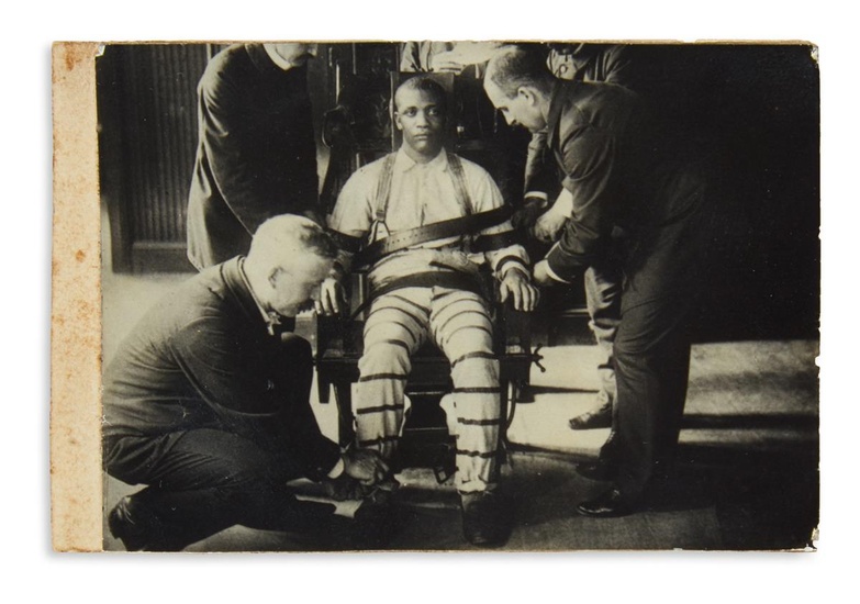 (PHOTOGRAPHY.) Condemned murderer Alfred Mayhew in the electric chair at Sing Sing. Silver...