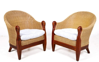 Pair Wicker and carved swan lounge chairs