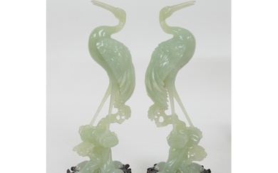Pair of Chinese pale celadon jade ornaments, carved as crane...