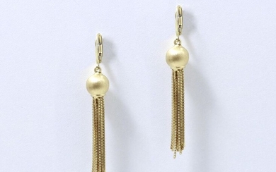 Pair of earrings in brushed 750 thousandths gold composed of balls holding flock chains.