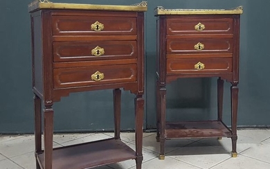 Pair of moulded mahogany lounge tables opening by...